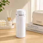 White 4-in-1 refillable travel dispenser bottle